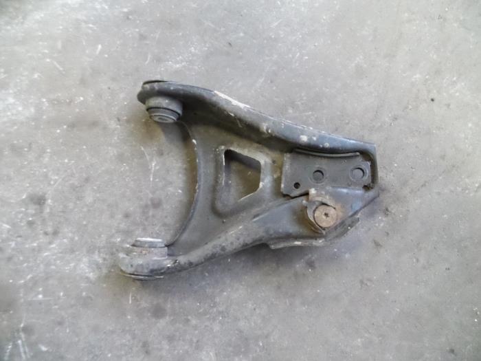 Front lower wishbone, right from a Renault Clio II Societe (SB) 1.5 dCi 68 2006