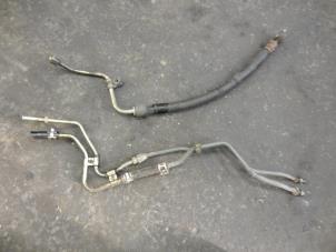 Used Power steering line Suzuki Swift (SF310/413) 1.3i 16V Price on request offered by Autodemontage Joko B.V.