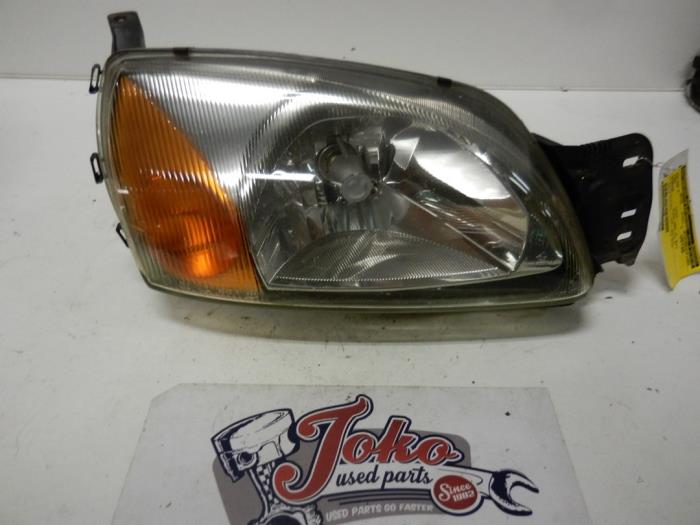 Używane Reflektor prawy Ford Courier (J3/5) 1.8 Di Cena na żądanie oferowane przez Autodemontage Joko B.V.