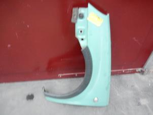Used Front wing, left Opel Corsa C (F08/68) 1.0 12V Price on request offered by Autodemontage Joko B.V.