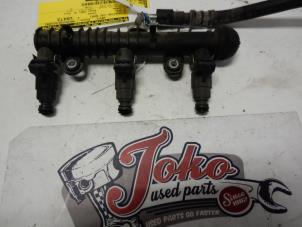 Used Fuel injector nozzle Opel Corsa C (F08/68) 1.0 12V Price on request offered by Autodemontage Joko B.V.