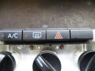 Used Panic lighting switch Daihatsu Cuore (L251/271/276) 1.0 12V DVVT Price on request offered by Autodemontage Joko B.V.