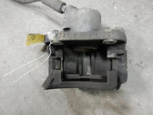 Used Front brake calliper, left Renault Twingo II (CN) 1.2 16V LEV Price on request offered by Autodemontage Joko B.V.