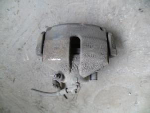 Used Front brake calliper, left Volkswagen Passat Variant (3C5) 2.0 TDI 16V 135 Price on request offered by Autodemontage Joko B.V.