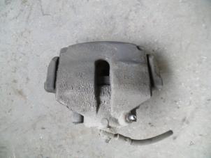 Used Front brake calliper, right Volkswagen Passat Variant (3C5) 2.0 TDI 16V 135 Price on request offered by Autodemontage Joko B.V.