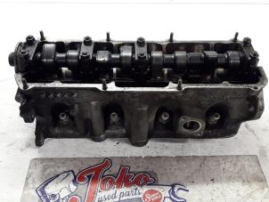 Used Cylinder head Audi 80 Price on request offered by Autodemontage Joko B.V.
