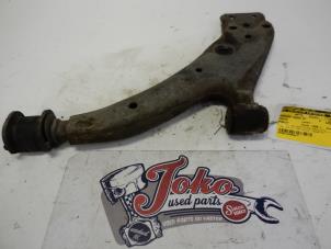 Used Front lower wishbone, right Toyota Starlet (EP9) 1.3,XLi,GLi 16V Price on request offered by Autodemontage Joko B.V.