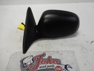 Used Wing mirror, left Hyundai Accent II/Excel II/Pony 1.3i 12V Price on request offered by Autodemontage Joko B.V.
