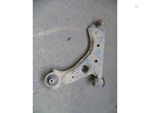Used Front lower wishbone, left Opel Corsa D 1.3 CDTi 16V ecoFLEX Price on request offered by Autodemontage Joko B.V.