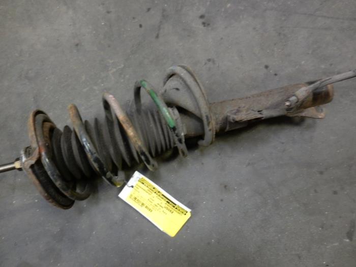 Front shock absorber rod, left from a Ford Fiesta 4 1.3i 1997