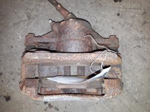 Used Front brake calliper, left Ford Mondeo III 2.0 TDCi/TDDi 115 16V Price on request offered by Autodemontage Joko B.V.