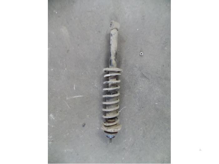 Rear shock absorber rod, left from a Volkswagen Polo III Classic (6KV2) 1.9 SDI 2001