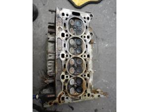 Used Cylinder head Opel Corsa B (73/78/79) 1.2i 16V Price on request offered by Autodemontage Joko B.V.