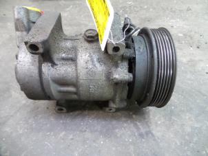 Used Air conditioning pump Renault Kangoo (KC) 1.4 Price on request offered by Autodemontage Joko B.V.