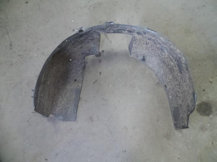 Wheel arch liner from a Opel Corsa C (F08/68) 1.2 16V 2003