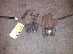 Used Rear brake calliper, right Ford Scorpio II (GFR) 2.3i 16V Price on request offered by Autodemontage Joko B.V.