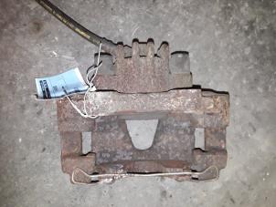 Used Front brake calliper, left Peugeot 306 (7A/C/S) 1.4 Price on request offered by Autodemontage Joko B.V.