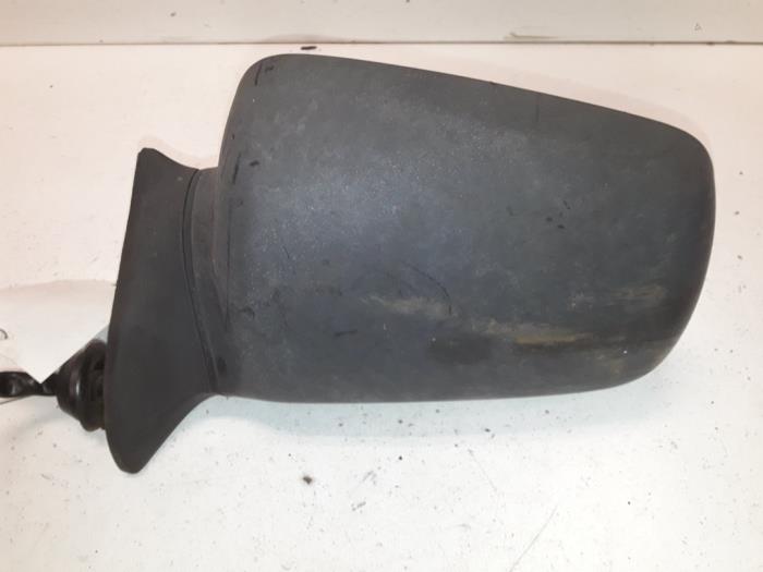 Wing mirror, left from a Chrysler Voyager/Grand Voyager 2.5 i S,SE 1995