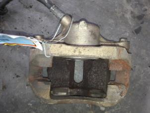 Used Front brake calliper, left Renault Kangoo Express (FC) 1.5 dCi 80 Price on request offered by Autodemontage Joko B.V.