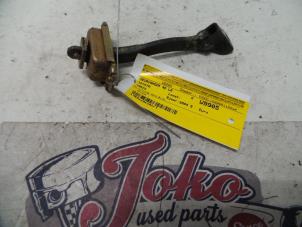 Used Rear door stop 4-door, left Toyota Yaris (P1) 1.3 16V VVT-i Price on request offered by Autodemontage Joko B.V.