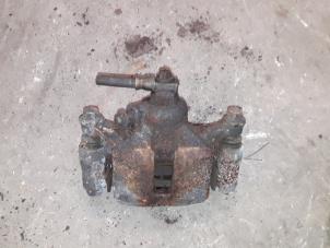 Used Rear brake calliper, left Opel Sintra 2.2i GLS,CD 16V Price on request offered by Autodemontage Joko B.V.