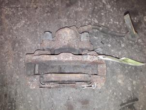 Used Front brake calliper, right Ford Ka I 1.3i Price on request offered by Autodemontage Joko B.V.