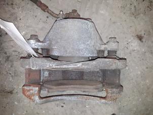 Used Front brake calliper, left Opel Sintra 2.2i GLS,CD 16V Price on request offered by Autodemontage Joko B.V.