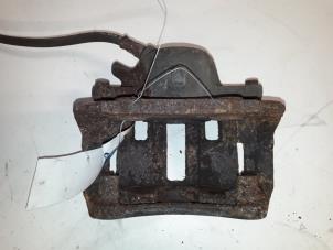 Used Front brake calliper, left Peugeot 406 Break (8E/F) 2.2 16V Price on request offered by Autodemontage Joko B.V.