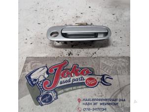 Used Front door handle 4-door, right Toyota Corolla (E11) 1.3 16V Price on request offered by Autodemontage Joko B.V.