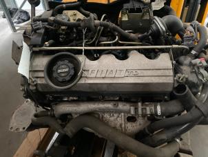 Used Engine Fiat Brava (182B) 1.9 TDS S,SX 75 Price on request offered by Autodemontage Joko B.V.