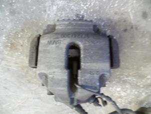 Used Front brake calliper, left BMW 3 serie (E90) 320d 16V Price on request offered by Autodemontage Joko B.V.
