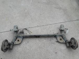 Used Rear-wheel drive axle Renault Clio II Societe (SB) 1.5 dCi 65 Price on request offered by Autodemontage Joko B.V.