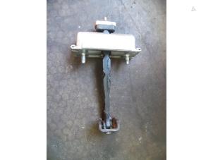 Used Front door stop 4-door, right Opel Corsa D 1.4 16V Twinport Price on request offered by Autodemontage Joko B.V.