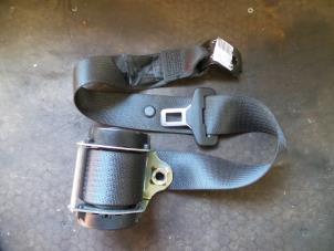 Used Rear seatbelt, centre Opel Corsa D 1.4 16V Twinport Price on request offered by Autodemontage Joko B.V.