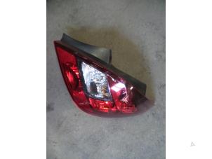 Used Taillight, right Opel Corsa D 1.4 16V Twinport Price on request offered by Autodemontage Joko B.V.