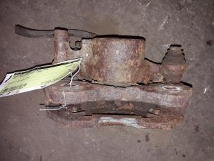 Used Front brake calliper, right Opel Frontera Wagon (MWL) 2.4i Price on request offered by Autodemontage Joko B.V.