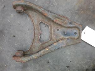 Used Front lower wishbone, left Renault Express/Rapid/Extra 1.9 D Price on request offered by Autodemontage Joko B.V.
