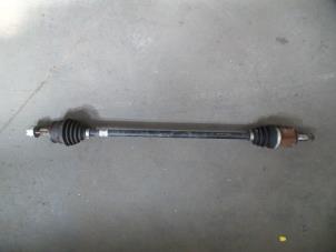 Used Front drive shaft, right Opel Corsa D 1.0 Price on request offered by Autodemontage Joko B.V.