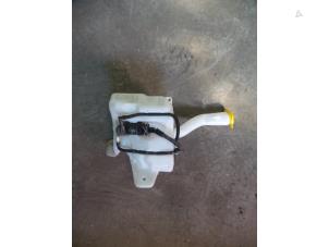 Used Front windscreen washer reservoir Opel Corsa D 1.0 Price on request offered by Autodemontage Joko B.V.