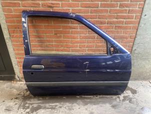 Used Door 2-door, right Ford Escort Price on request offered by Autodemontage Joko B.V.