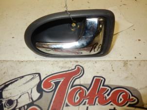 Used Rear door handle 4-door, right Mazda Premacy 1.8 16V Price on request offered by Autodemontage Joko B.V.