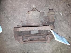 Used Front brake calliper, right Ford Escort 6 Express (AVL) 1.8 D Express 55/75 Price on request offered by Autodemontage Joko B.V.