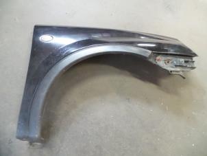 Used Front wing, right Opel Corsa C (F08/68) 1.3 CDTi 16V Price on request offered by Autodemontage Joko B.V.
