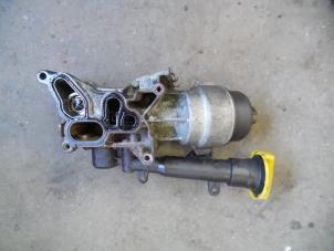 Used Oil filter housing Opel Corsa C (F08/68) 1.3 CDTi 16V Price on request offered by Autodemontage Joko B.V.