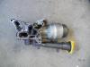Oil filter housing from a Opel Corsa C (F08/68) 1.3 CDTi 16V 2005