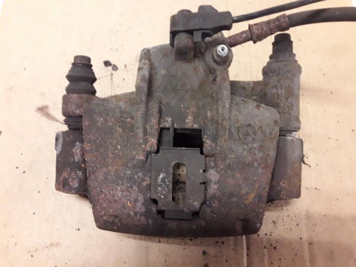 Front brake calliper, left from a Mercedes-Benz Vito (638.0) 2.3 110D 1999