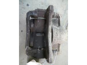Used Front brake calliper, left Toyota Corolla (E11) 2.0 D Price on request offered by Autodemontage Joko B.V.