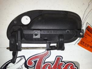 Used Front door handle 4-door, right Volvo S40/V40 Price on request offered by Autodemontage Joko B.V.