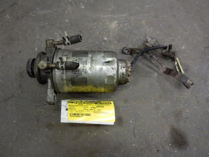 Fuel filter housing from a Toyota Corolla (E11) 2.0 D 1998