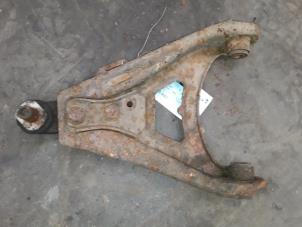 Used Front lower wishbone, right Renault Express Price on request offered by Autodemontage Joko B.V.
